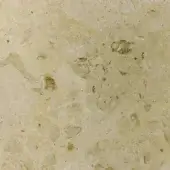 Batik marble texture, light beige and tan with brown-gray speckles, porous surface displaying natural stone variations and organic patterning.