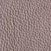 Gray-taupe nubuck leather texture with a dense, irregular bumpy pattern and matte finish, displaying subtle tonal variations within the grain.