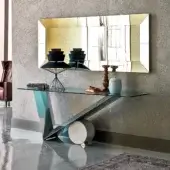 Elegant Cattelan Italia Valentinox console with clear glass top and polished stainless steel base accented in white Carrara marble