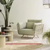 Exceptional Roberti Rattan Armàn lounge chair crafted with light green Oval Trendyrope and a powder-coated stainless steel frame