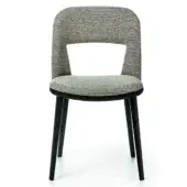 Distinctive Bross Path chair with rounded seat and cutout backrest upholstered in textured light and dark tones with dark stained wood structure