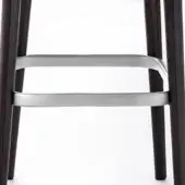 Break Stool footrest with dark brown wood legs and brushed silver metal frame, featuring curved leg connections and visible wood grain.