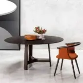 Distinguished Bross River table with dark brown wood top and three-leg central base crafted in Italy with a smooth finish