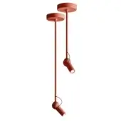 Bird pendant lights, brick red metal, cylindrical rods with adjustable spotlight heads and circular ceiling mount, matte finish.