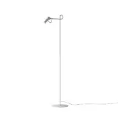 Floor lamp, brushed silver metal, minimalist design with curved arm and cylindrical head against a white backdrop.