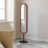Exquisite Bolzan Letti Lap mirror padded in deep red textile with a slender dark metal rod and matte metal base
