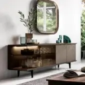 Distinguished Ozzio Italia Brera sideboard with lacquered wood and glass doors, built with painted metal feet and internal illumination
