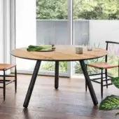 Superior Miniforms Pixie table with a light brown wooden top and sleek black edge supported by matte black cylindrical legs