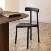 Distinguished Miniforms Bice chair crafted in Italy with a matte black finish and unique flap-ears backrest design