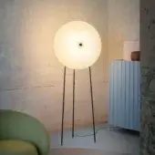 Superior Miniforms Rificolona floor lamp with a round shade crafted in recycled polyethylene and slender dark metal tripod legs