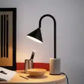 Exceptional Miniforms Ozz table lamp with curved black metal arm and conical shade in matte textured concrete base