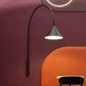 Distinguished Miniforms Ozz wall lamp with a gracefully curved black metal arm and conical shade
