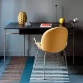 Elegant Bross Rohe desk with a dark ashwood top and light gray metal frame offers privacy with an optional fabric edge