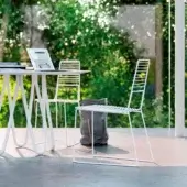Superior Casamania Alieno chair crafted in painted metal with a minimalist design and horizontal backrest