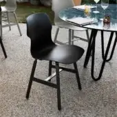 Distinguished Casamania Stereo chair with organically shaped black synthetic material and smooth matte finish