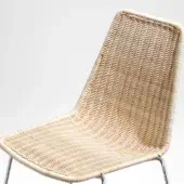 Dining chair with natural wicker seat and backrest, polished metal frame, curved tapered back, minimalist contemporary design, studio shot.