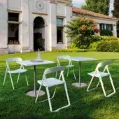 Sophisticated Casamania T1 Bistrot Protected Outdoor table with white HPL top and silver-toned metal base crafted in Italy