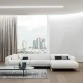 Lavish Cierre1972 Oscar sectional with white material upholstery, chromed metal base and siliconized microfiber cushions