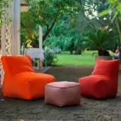 Exceptional Casamania Morfino lounge chair with slightly concave form and matte muted red leatherette upholstery
