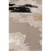 Woven fabric swatch with abstract painterly design, taupe gray background, creamy white, gold, and black brushstrokes, textured edge.