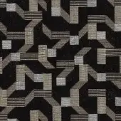 Pachisi 003 fabric with interlocking black, cream, and gold geometric ribbons; Art Deco inspired linear woven texture on black background.