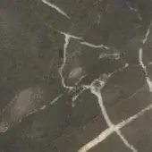 Valentine Grey marble close-up with dark grey base, white veining, and subtle gold lines; polished, dense stone texture.