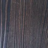 Moka sandblasted larch wood texture displays a dark brown, matte finish with vertical grain and subtle ridges from the sandblasting process.