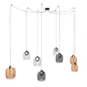 Chandelier with nine glass pendants in clear, amber, and gray tones, featuring a black circular canopy and staggered, cascading wire arrangement.
