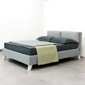 Sophisticated Horm Bahamas bed with gray textile upholstery and crisp white lacquered solid beechwood legs crafted in Italy