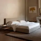 Superior Horm Lipari bed with light gray textile upholstery and mocha lacquered solid beechwood feet