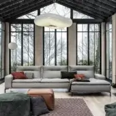 Innovative Cierre1972 Carlton sectional with light gray upholstery and smooth matte finish