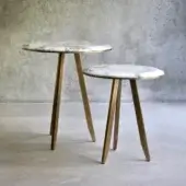 Distinguished Casa Casati Mirage side table with marble top and thin matte gold metal legs crafted in Italy