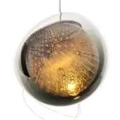 Pendant light, glass and metal, spherical fixture with textured dark grey inner sphere and visible grid pattern, warm light emission.