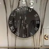 Distinguished Reflex Titanium Clock, a timepiece with smoked mirror glass and titanium hands, exhibiting a minimalist reflective surface