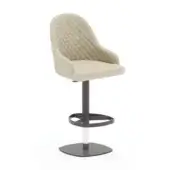 Beige bar stool with quilted fabric seat and back, dark gray metal stem, circular footrest, and polished silver central column.