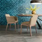 Superior Cattelan Italia Musa chair with tan hue and smooth light brown wooden frame exhibiting graceful curves