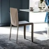 Superior Cattelan Italia Piuma chair in muted brown leather with a distinctive ‘V’ shaped stitched detail and angular silhouette