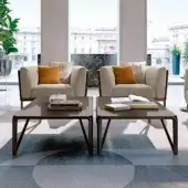 Distinguished Turri Milano coffee table with curved brushed nickel metal and glossy lacquered wood top in dark gray-brown
