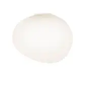 Ceiling light, white opaque glass, irregular spherical shade with matte finish and circular mounting plate in studio lighting.