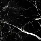 Marquinia marble texture sample, black with white veining, high-gloss polished surface displaying irregular patterns and tonal variations.
