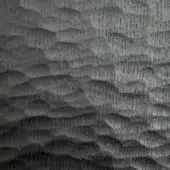 Heritage black stained oak veneer paneling displays raised ridges, vertical striations, and a matte finish with a topographic texture.