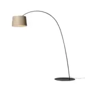 Distinctive Foscarini Twiggy Wood floor lamp with gracefully curved shade built from limed maple oak and fiberglass composite in a black finish