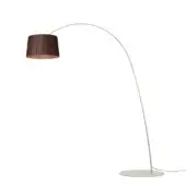 Distinguished Foscarini Twiggy Wood floor lamp with a curved silhouette crafted in limed maple oak and fiberglass composite with a matte finish