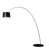 Distinguished Foscarini Twiggy Elle floor lamp with a dramatically curved fiberglass composite silhouette and liquid coated black finish