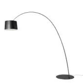 Elegant Foscarini Twiggy Elle floor lamp with a slender arched silhouette in graphite fiberglass-based composite and epoxy powder coated metal