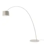 Distinguished Foscarini Twiggy Elle floor lamp crafted with a curved fiberglass composite and metal base in a liquid-coated greige finish