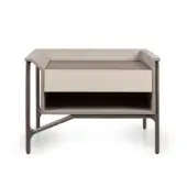 Bedside table, light beige leather and dark brown wood, rectangular top with curved frame and tapered legs.