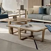 Superior Turri Vine coffee table with a rectangular light-colored marble top and brushed gold embellished wooden base