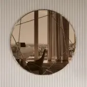 Exceptional Bontempi Coco mirror crafted with polygonal engravings and a smooth golden-brown metal finish