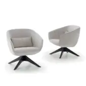 Elegant Pacini & Cappellini Mya lounge chair with a light grey fabric shell and solid ash wood base featuring a dark painted finish